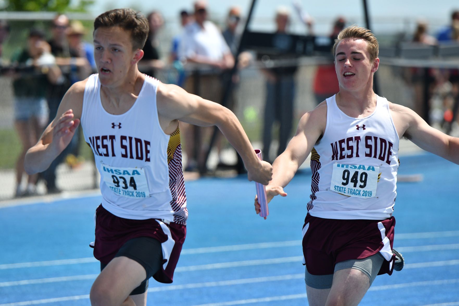 WS boys take second at 2A State tourney Brigham Cook taking the Baton from Enoch Ward in the 4X100 for a Silver Medal.jpeg